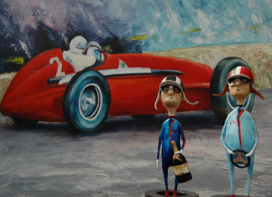 Een schilderij van een raceauto met het nummer 2 erop