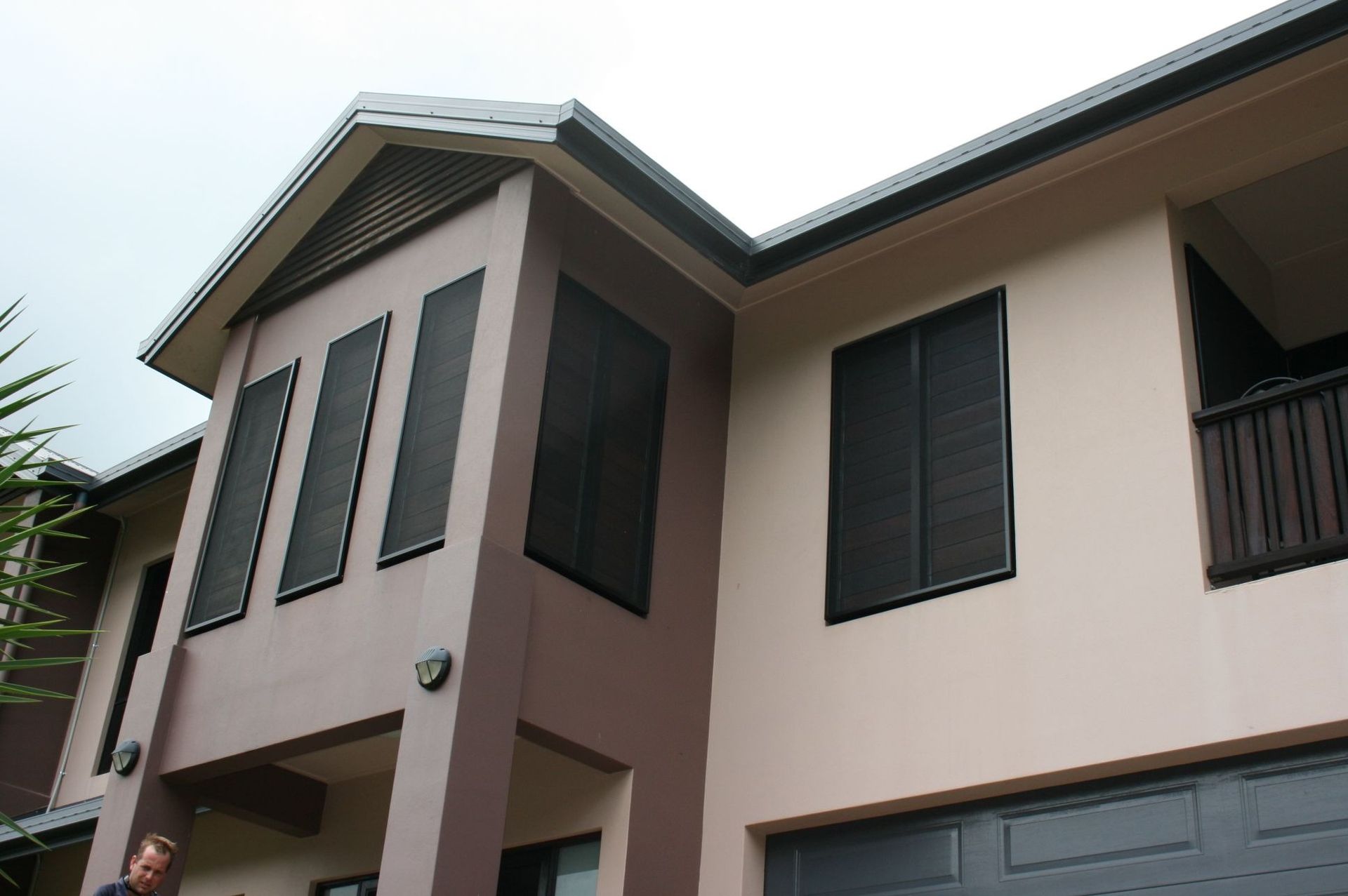 Modern House with Dark Window Shutters