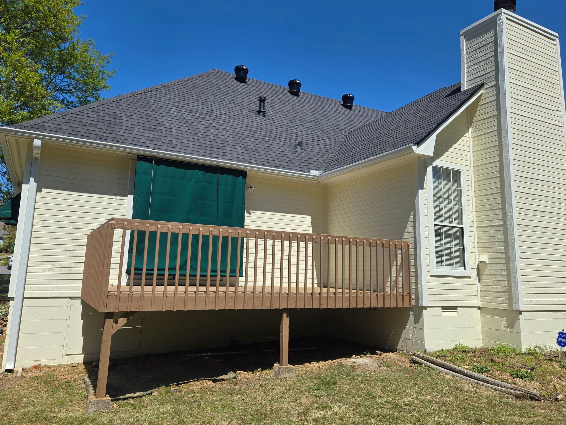 CertainTeed Landmark architectural in Moire Black. 6” seamless gutters and downspouts in white. House painted in Sherwin Williams ‘Morning Sun’. All trim painted in Sherwin Williams ‘Westhighland White’