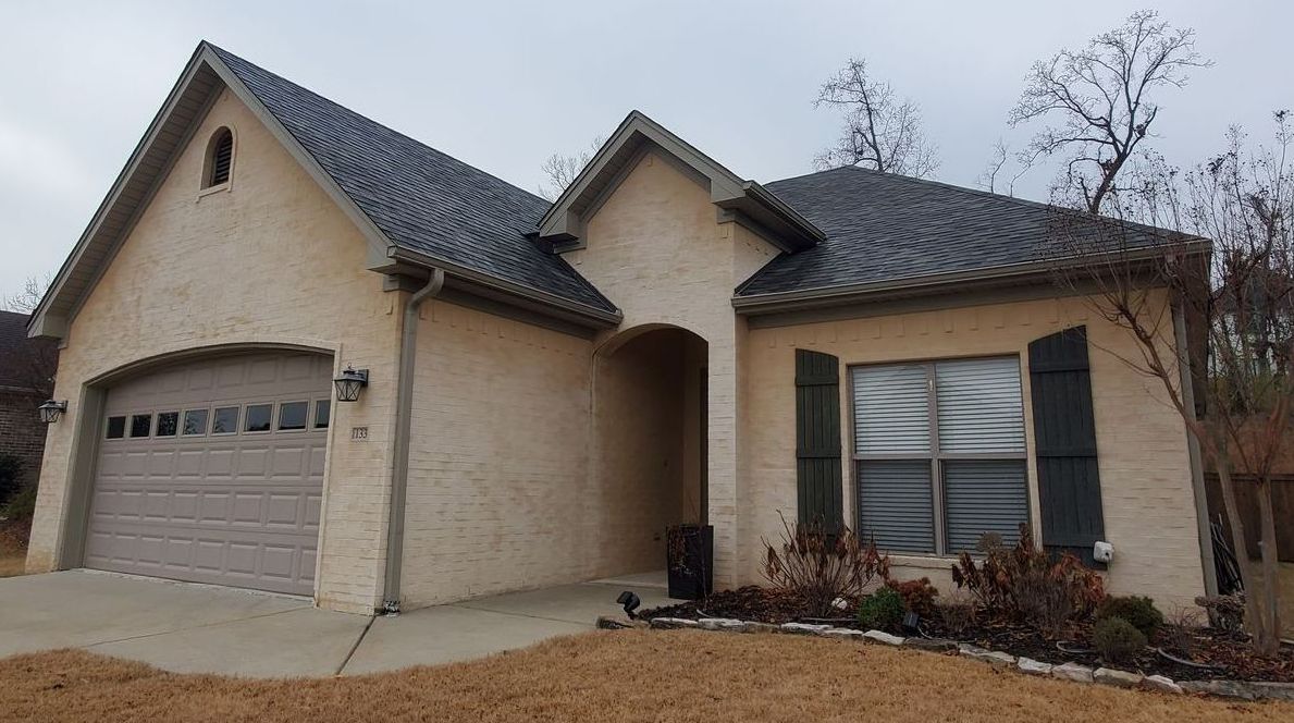 Malarkey Highlander architectural in Storm Grey. 6” seamless gutters and downspouts in Pebblestone Clay