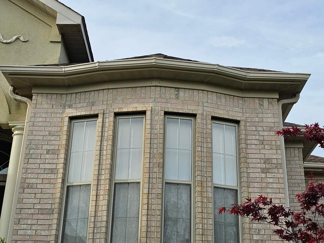 6” seamless gutters and downspouts in Herringbone