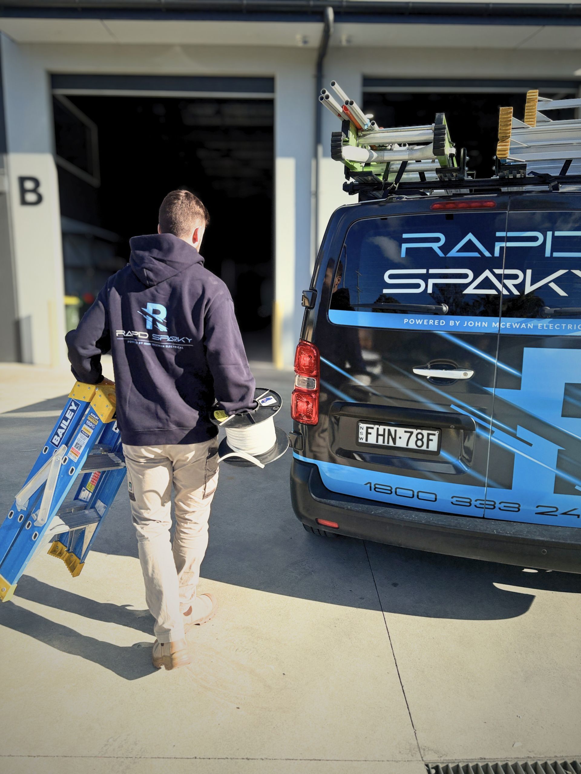 An Electrician Stepping Out Of A Car