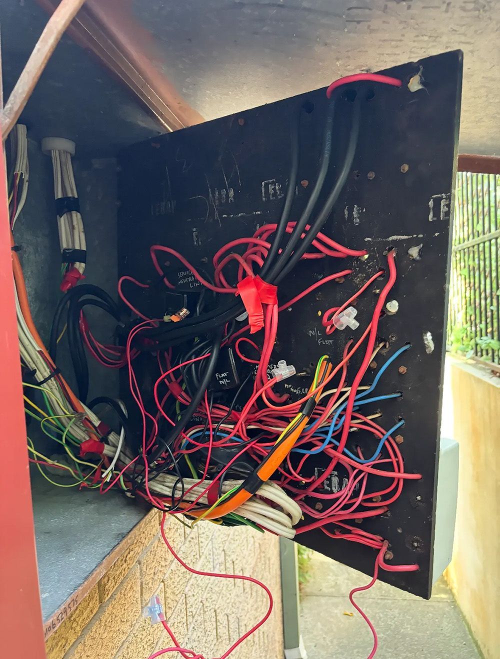 Open Electrical Box with a Chaotic Tangle Wires — Rapid Sparky in Wollongong, NSW