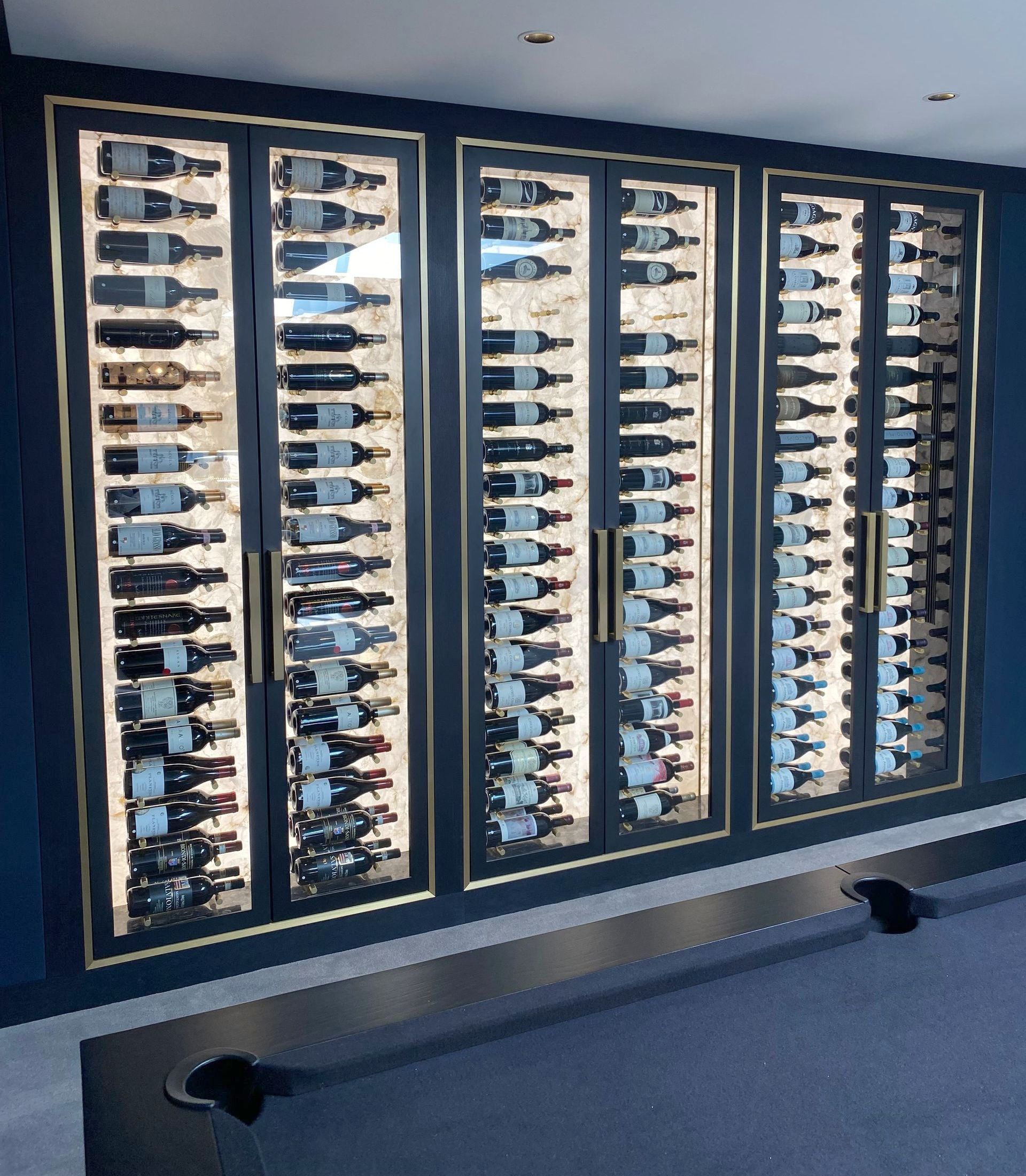 Modern Wine Wall in surrey mansion games room