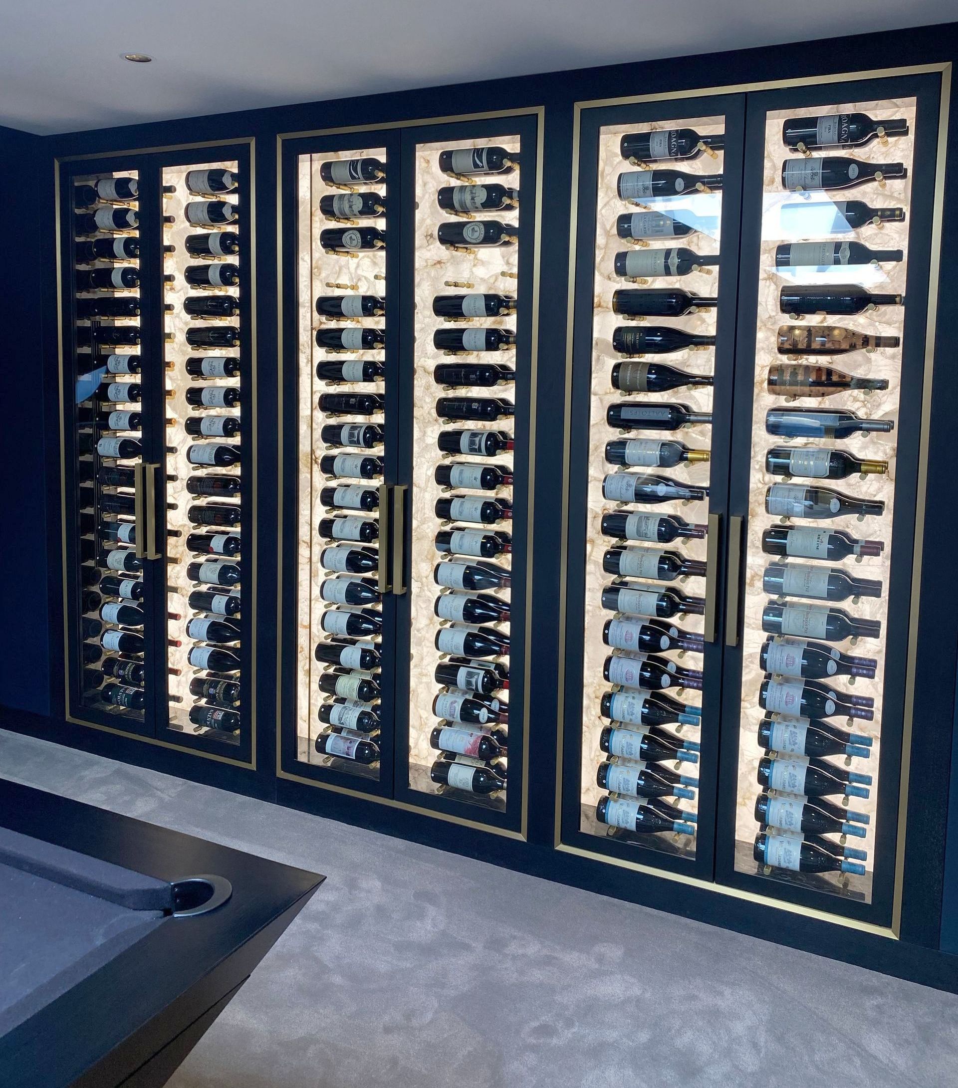 Modern Wine Wall in surrey mansion games room