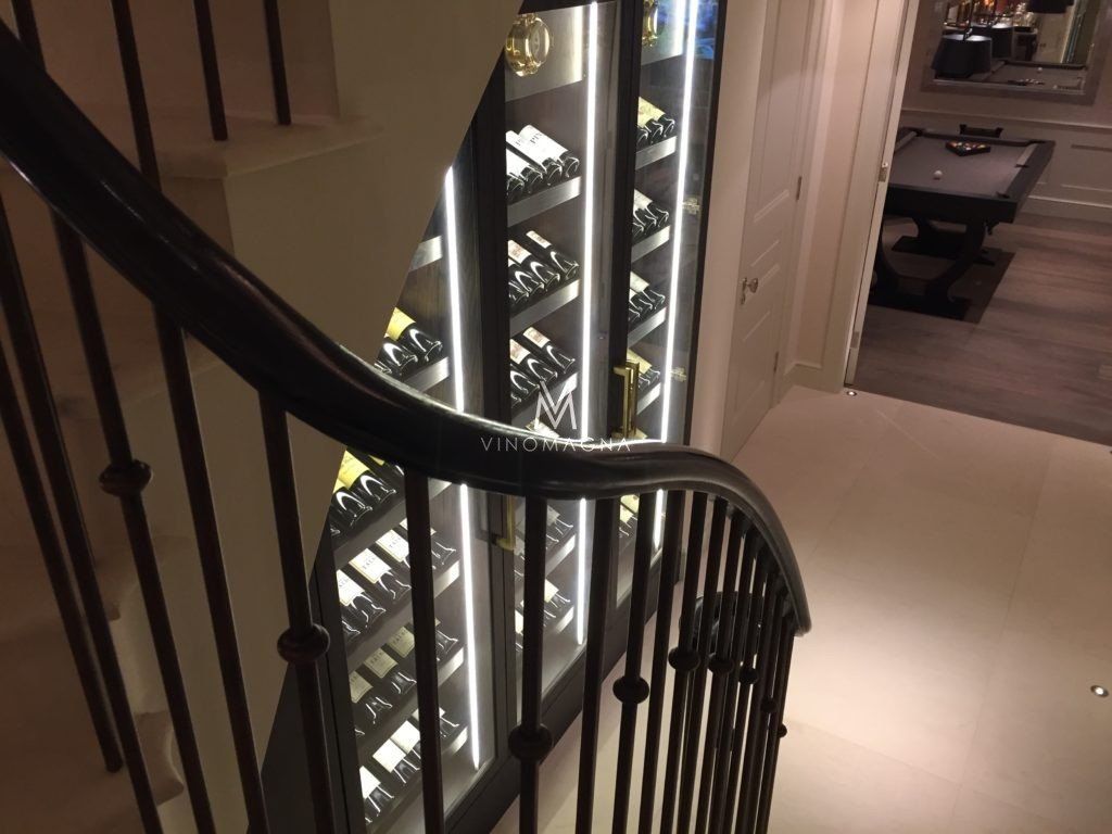 under stairs custom wine display from stairs Vinomagna