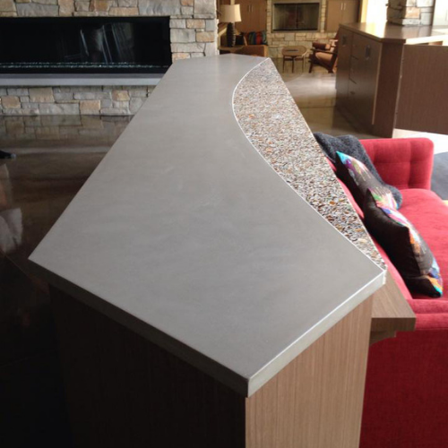 A concrete countertop in a kitchen.