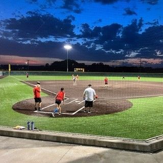 Spirit Park kickball game with teams in the field await the pitch.