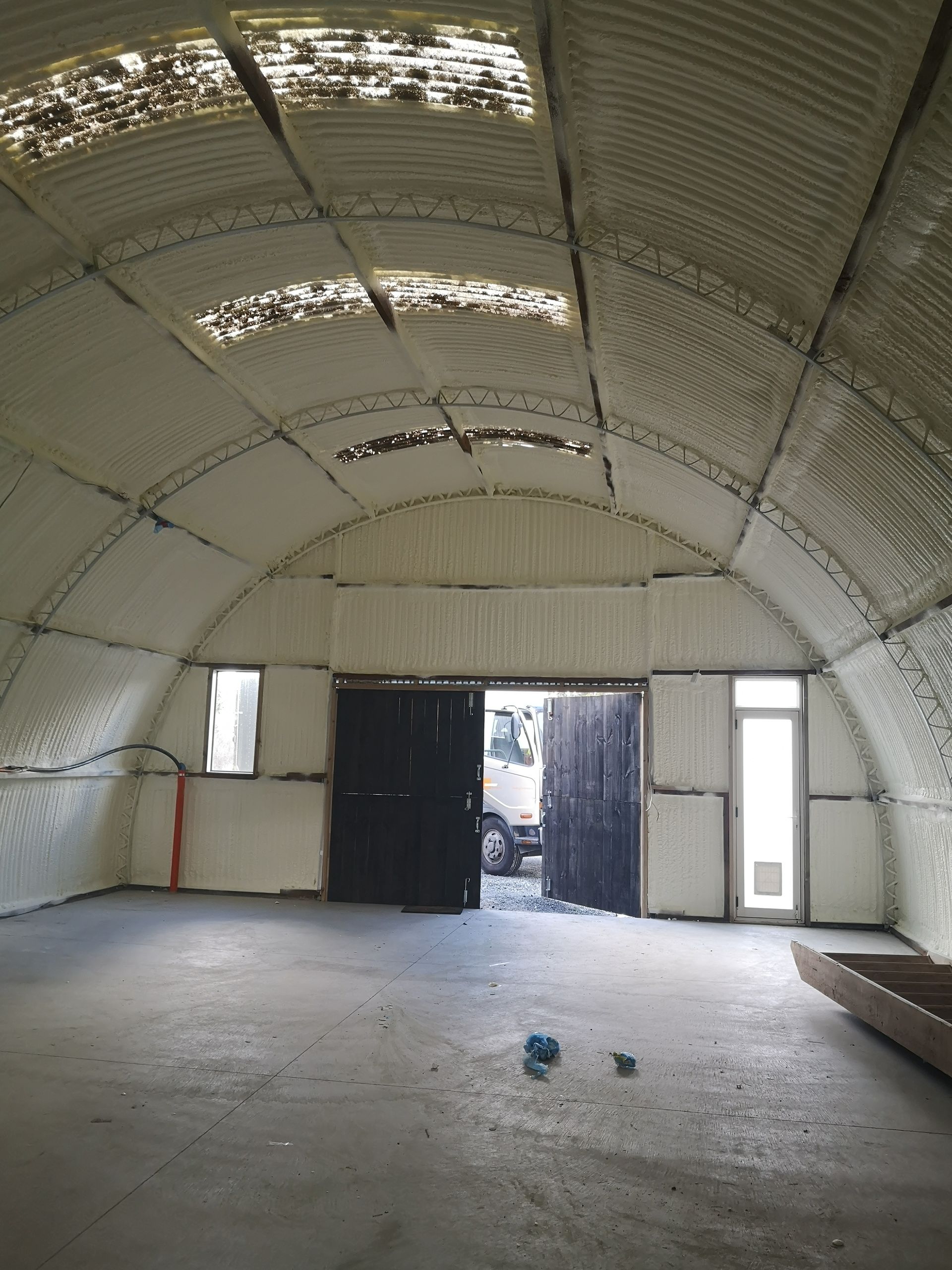 A large empty room with a lot of foam on the walls and ceiling.