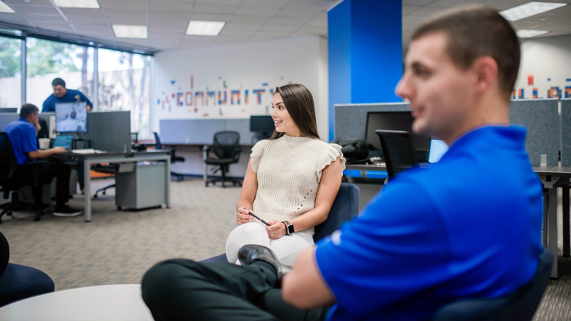 people in shared office space