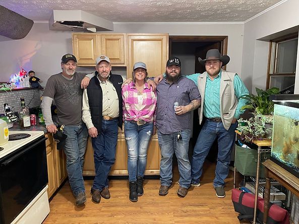 A group of people in a kitchen