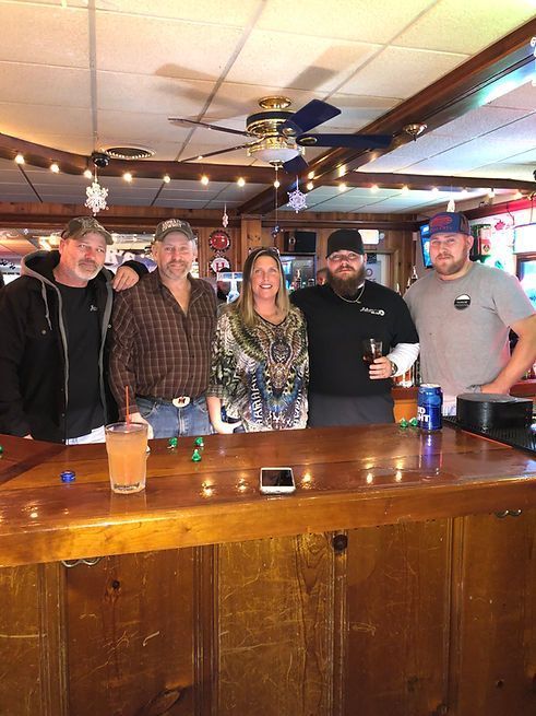 A group of people in a bar