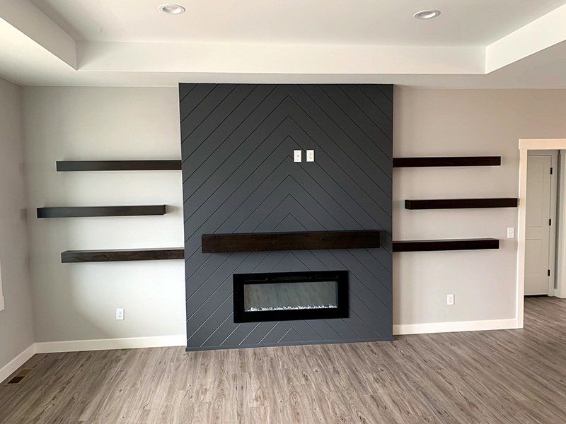 wood-faced fireplace with shelves front view
