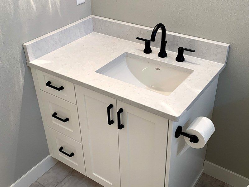 white bathroom sink cabinets