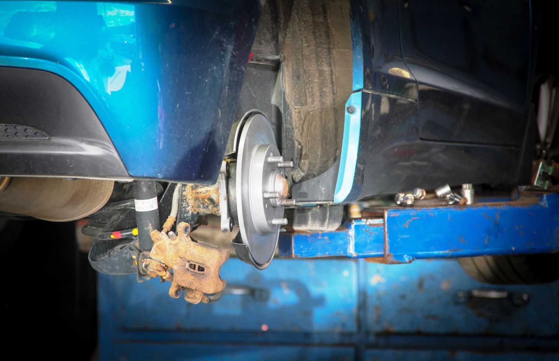 replaced car wheel lug nut holder