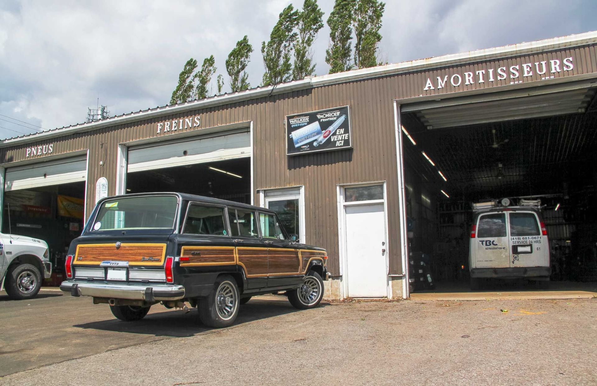parked vehicles in front of service station