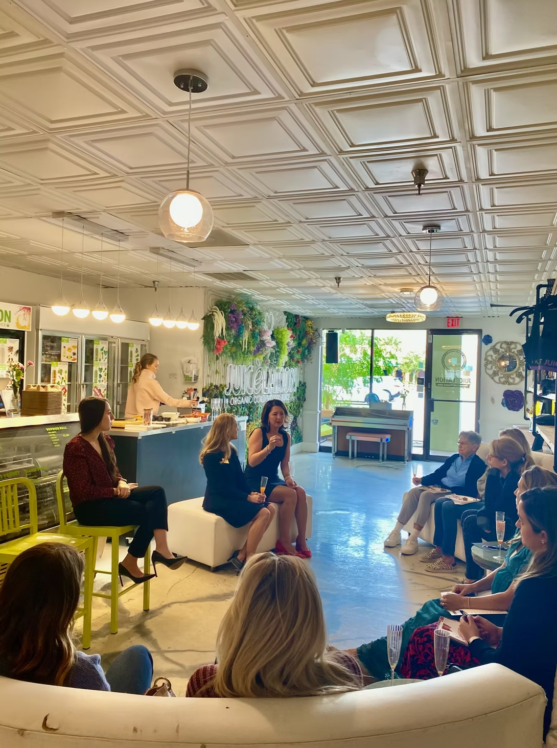 A panel discussion in a brightly lit room 