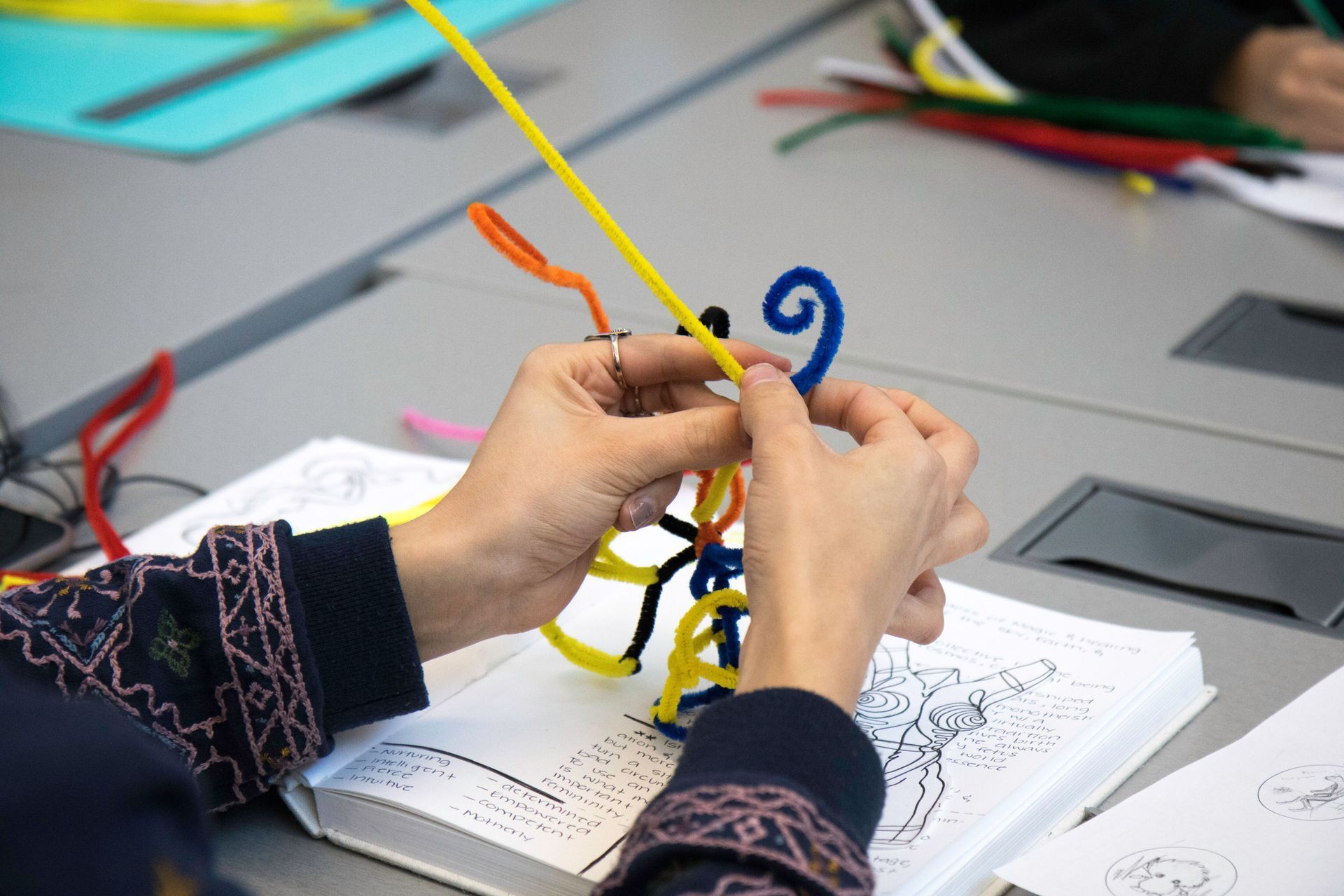 See a student creating a Creature Family Project to demonstrate inherited and acquired traits.