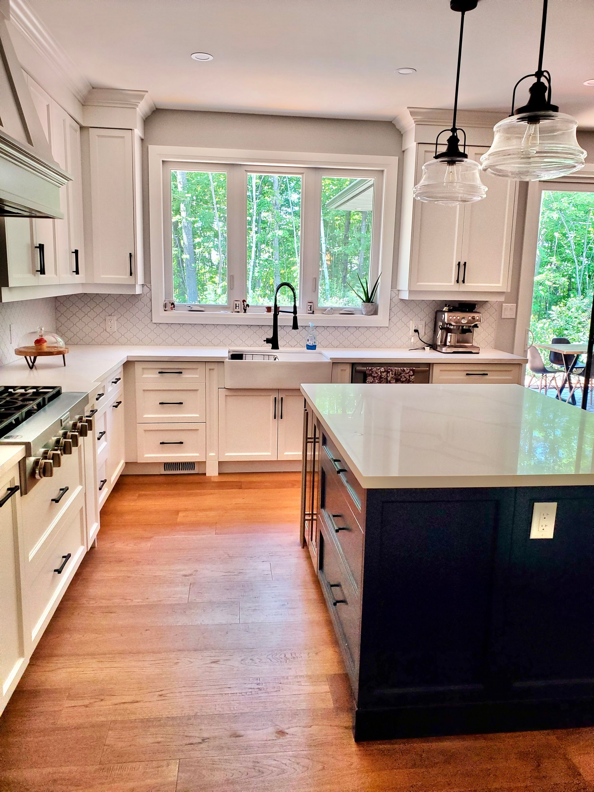 Interior renovation - white oak engineered hardwood floors with white oak railing, white oak stairs with white risers.
