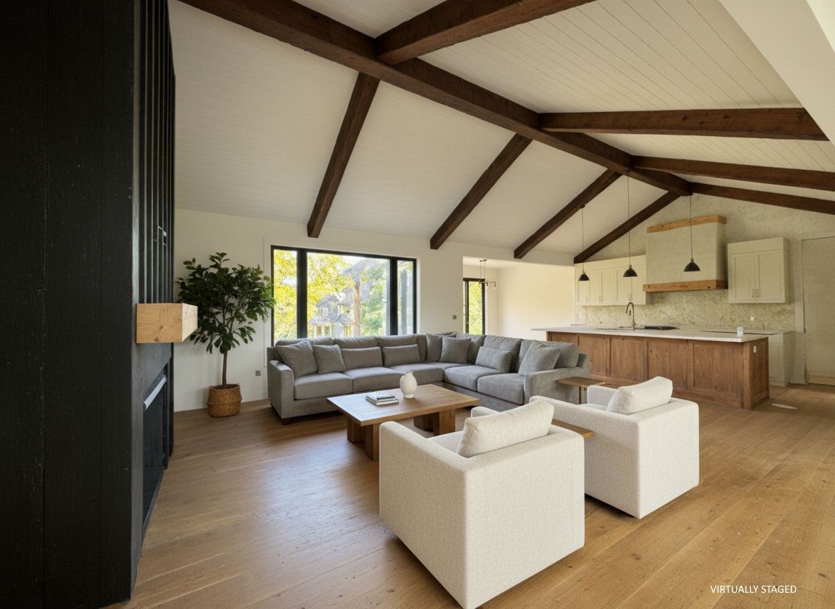 Open concept family room with furniture, shiplap ceiling, faux rafters and ridge beam kitchen in backgrounfd