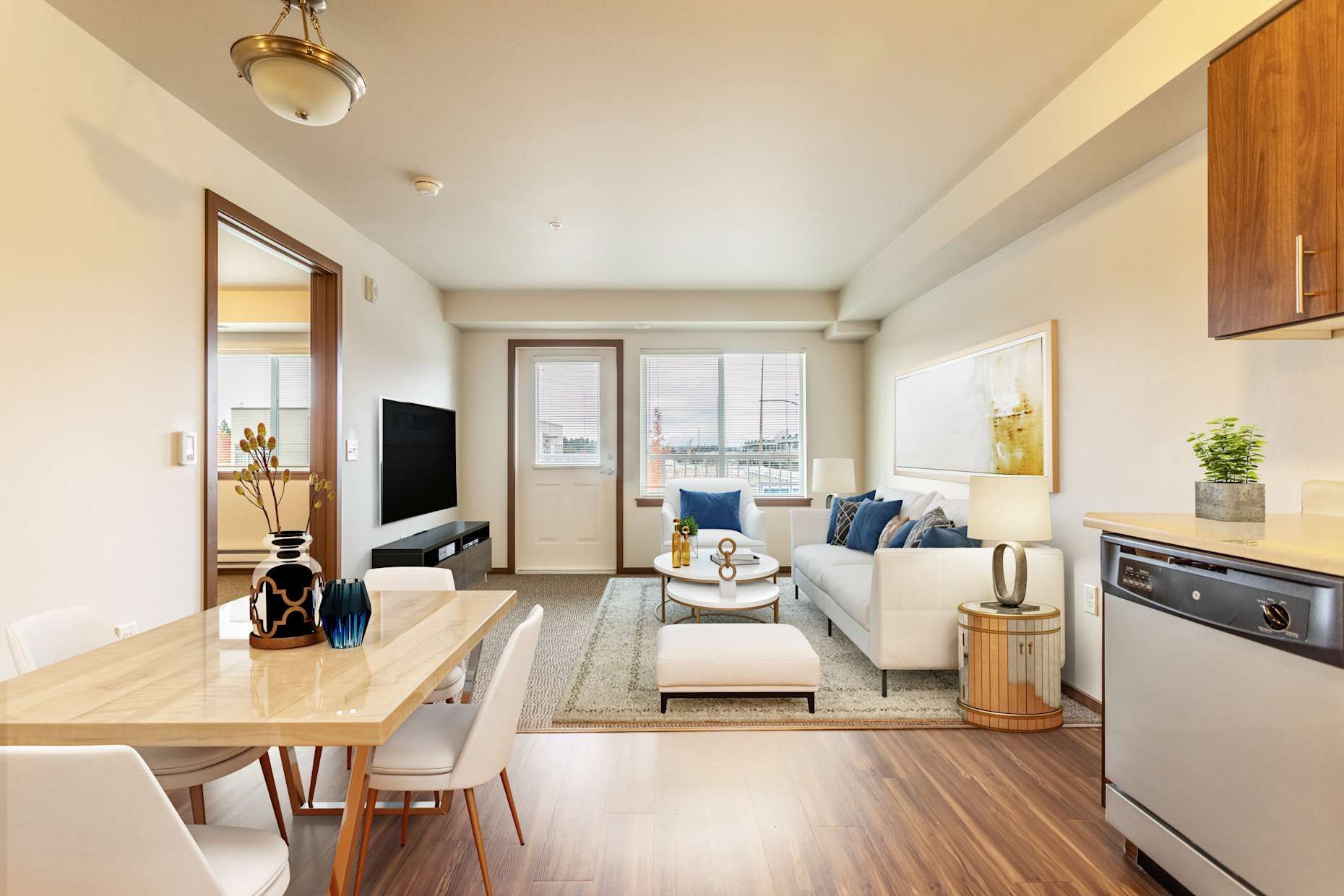Living room: white couch, dining table, TV, wood floors, door to balcony.