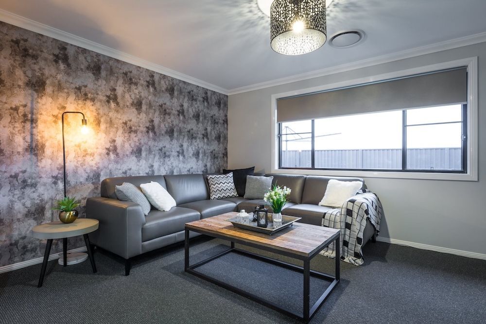 A Kitchen With White Cabinets , Stainless Steel Appliances , And A Large Island — Morphett Construction In Quirindi, NSW