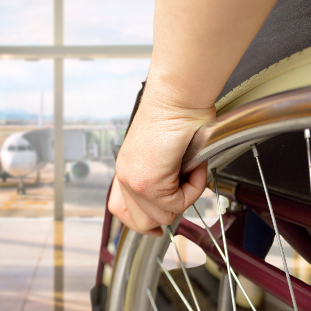A person in a wheelchair at the airport