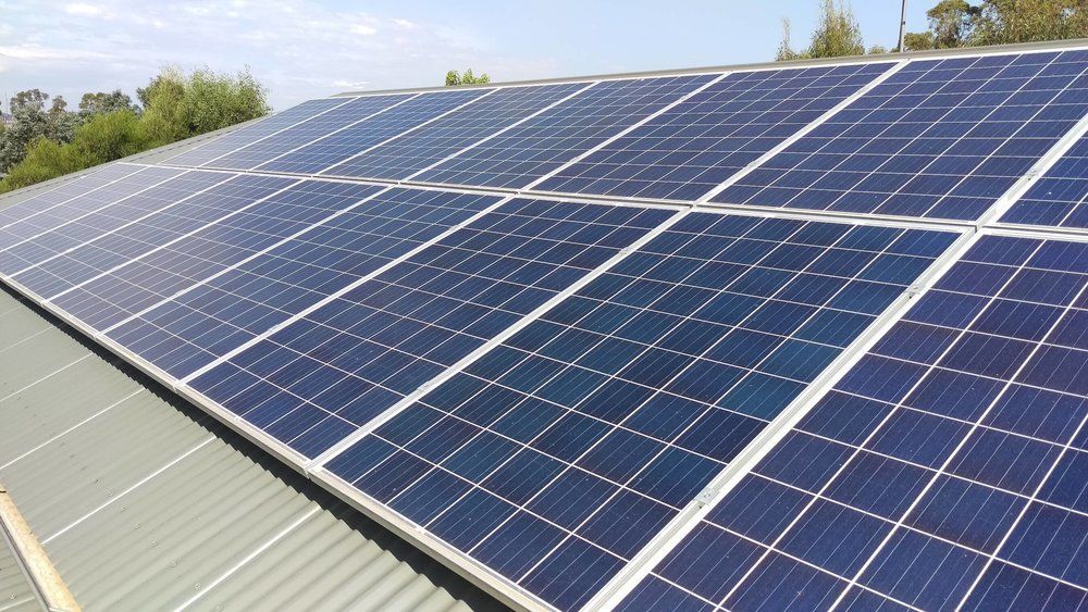 A Roof With a Lot of Solar Panels on It — DLG Electrical & Solar In Hunter Valley, NSW