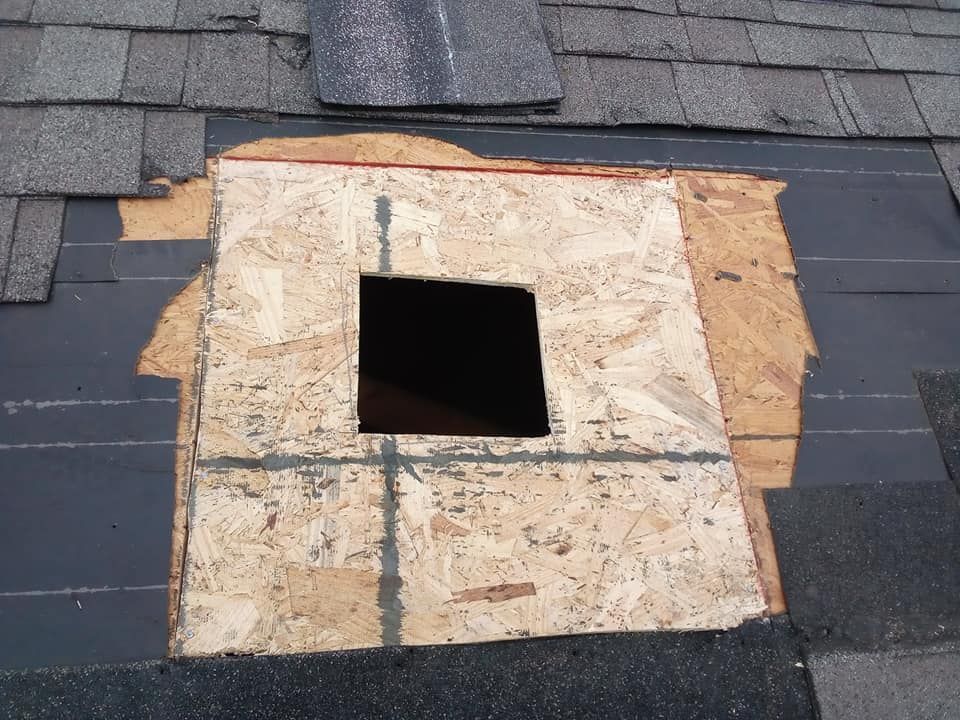 A roof with a hole in the middle of it