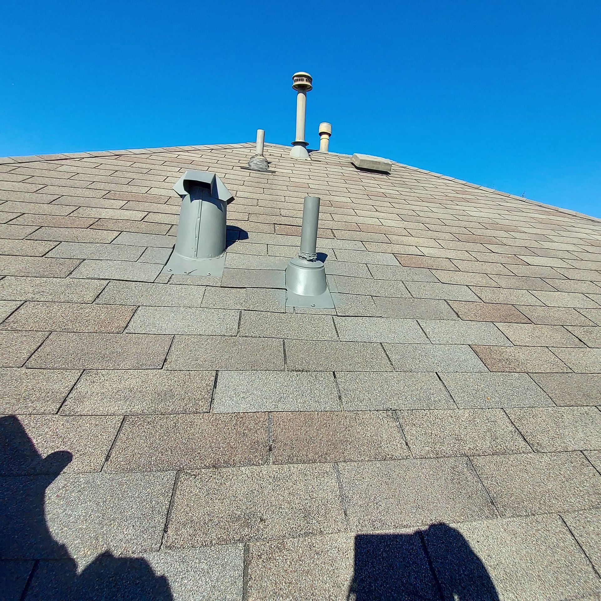 A roof with a chimney on top of it