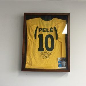 A yellow jersey with the number 10 on it