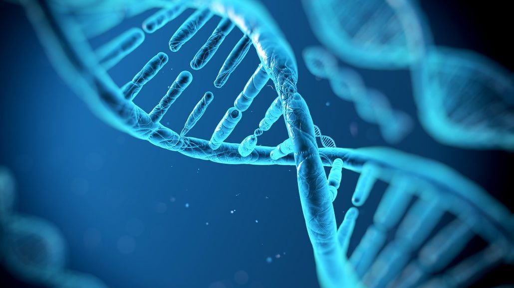 A close up of a dna strand on a blue background.