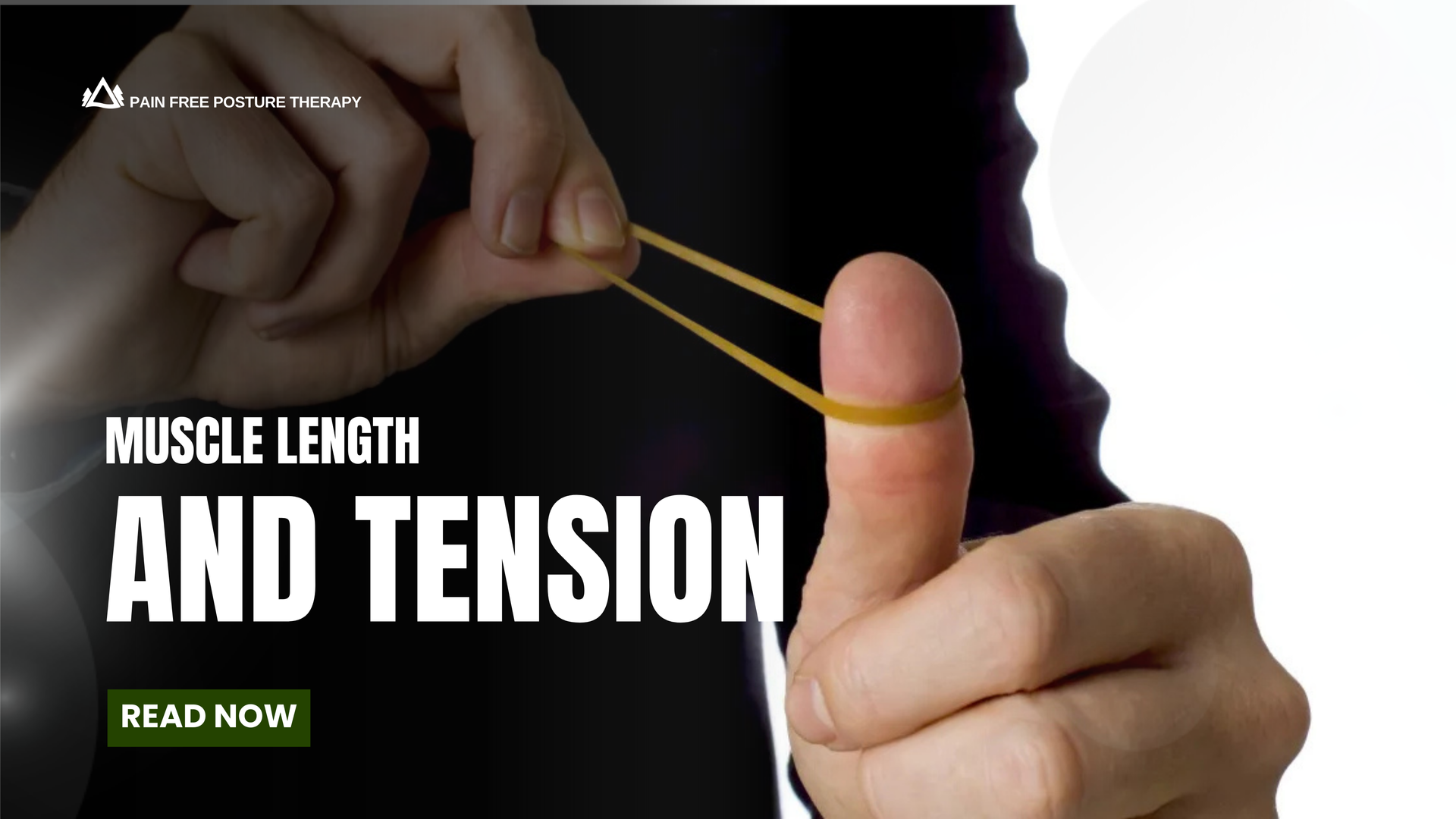 A person is holding a piece of string between their fingers.