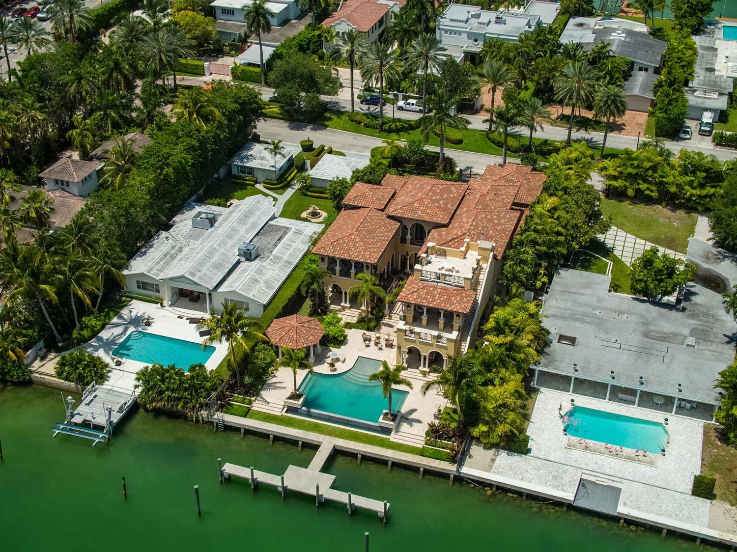 Aerial View of Wide Houses and Pools