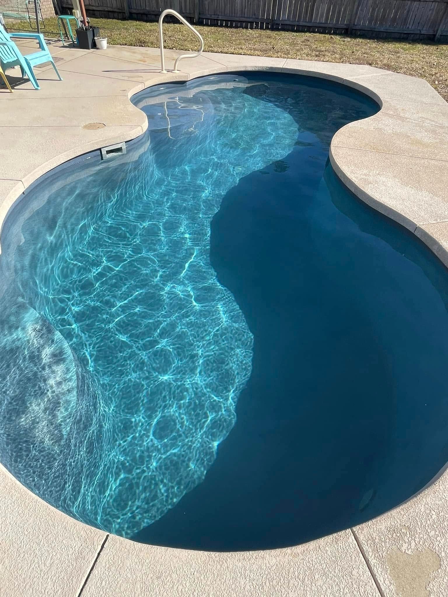 Concrete Floor Surrounds the Swimming Pool