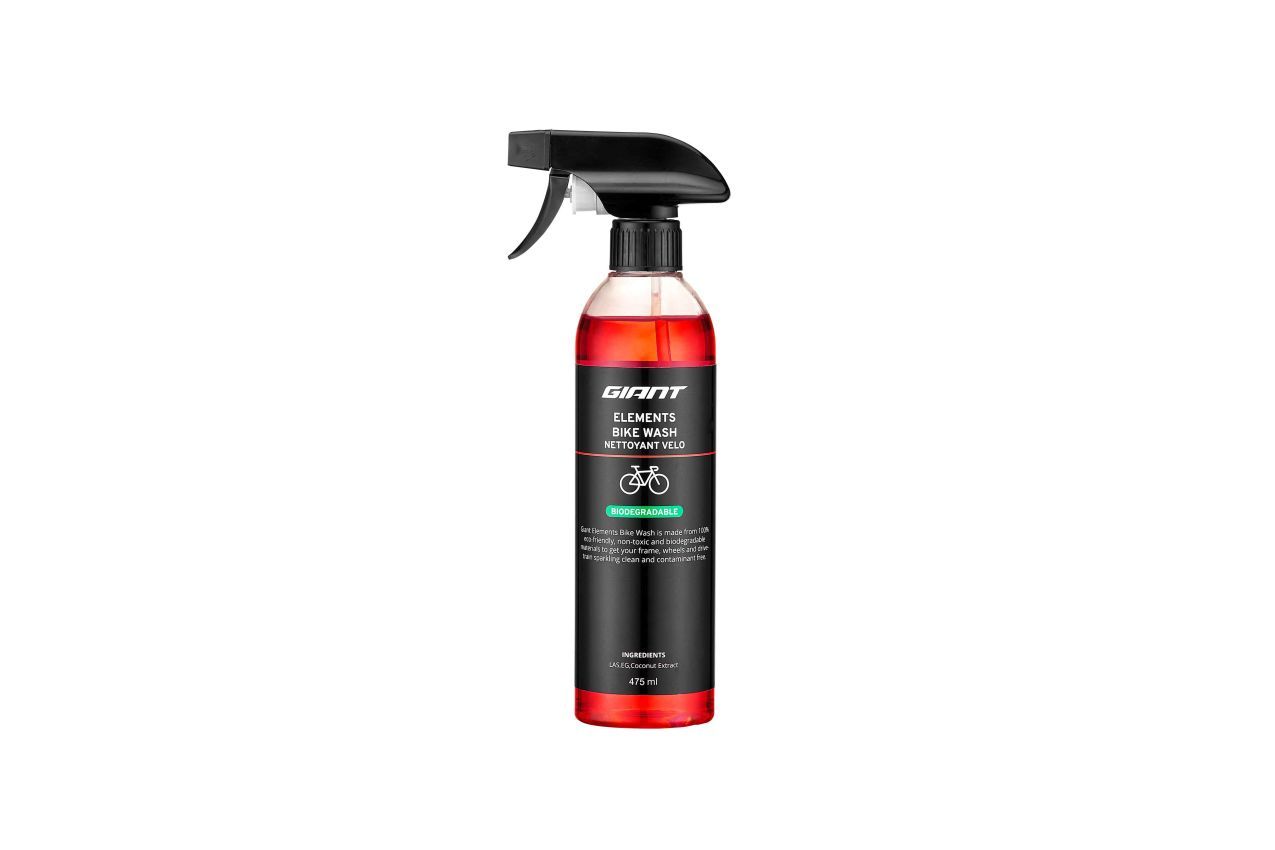 Black and red spray bottle with black trigger, product label visible.