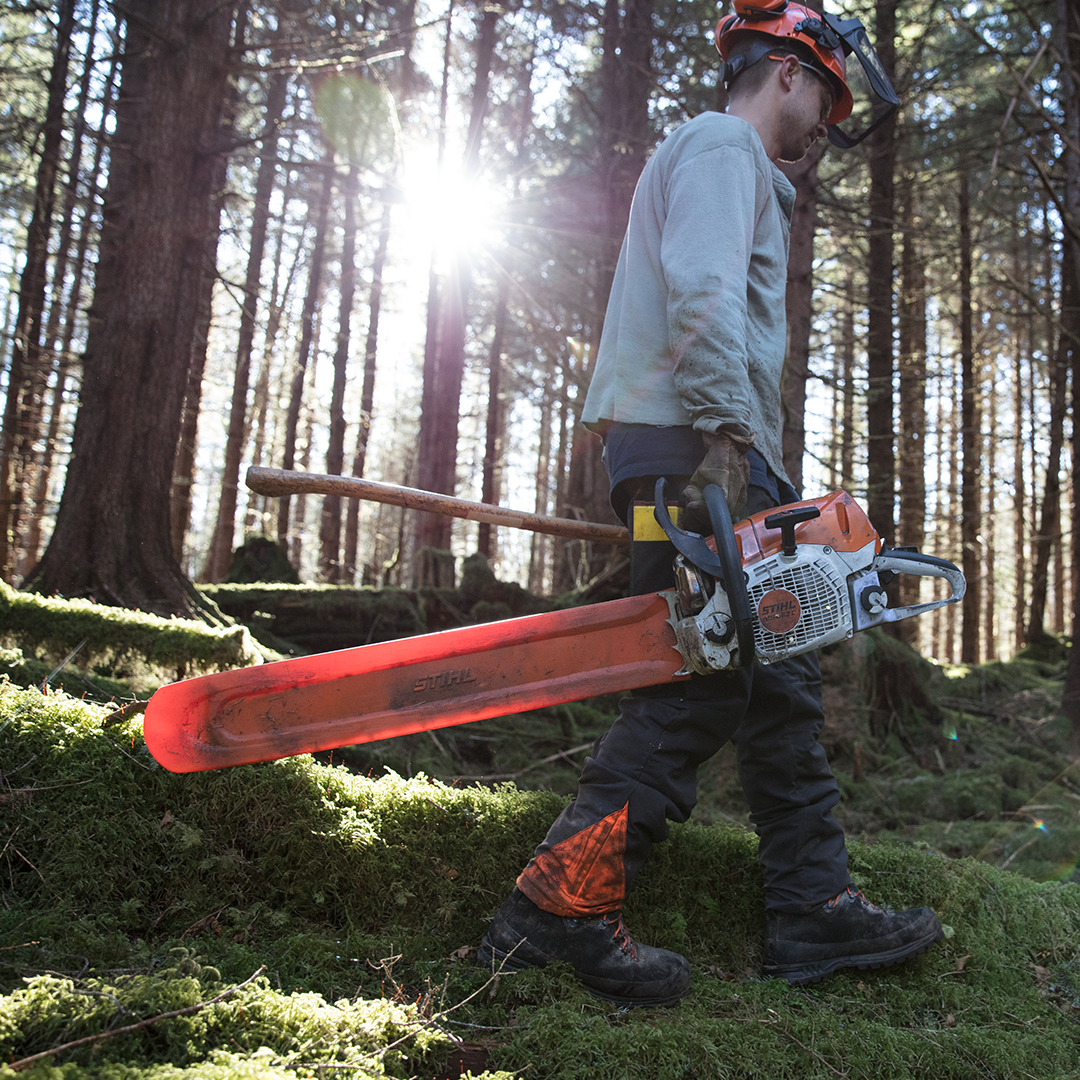 Closeup Of Yellow Mower Cutting The Grass — The Saw Spot In Kyogle NSW