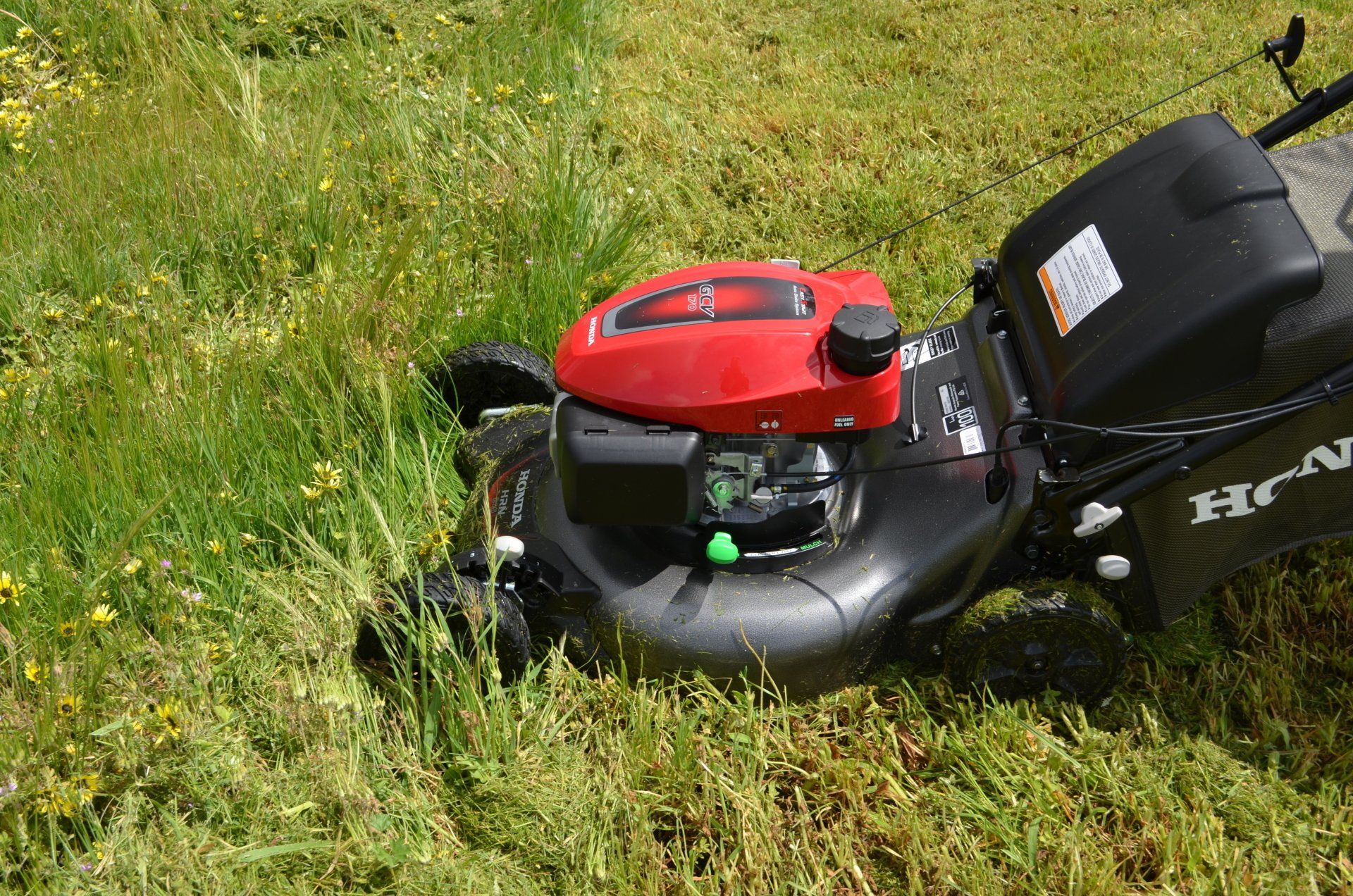 Silver Lawn Mower In The Garden — The Saw Spot In Kyogle NSW
