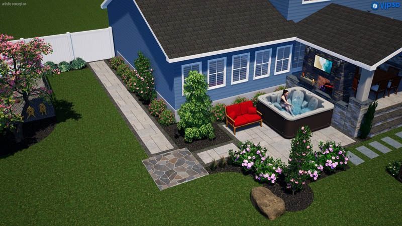 Backyard with a blue house, hot tub, patio, green lawn, trees, and flowers.