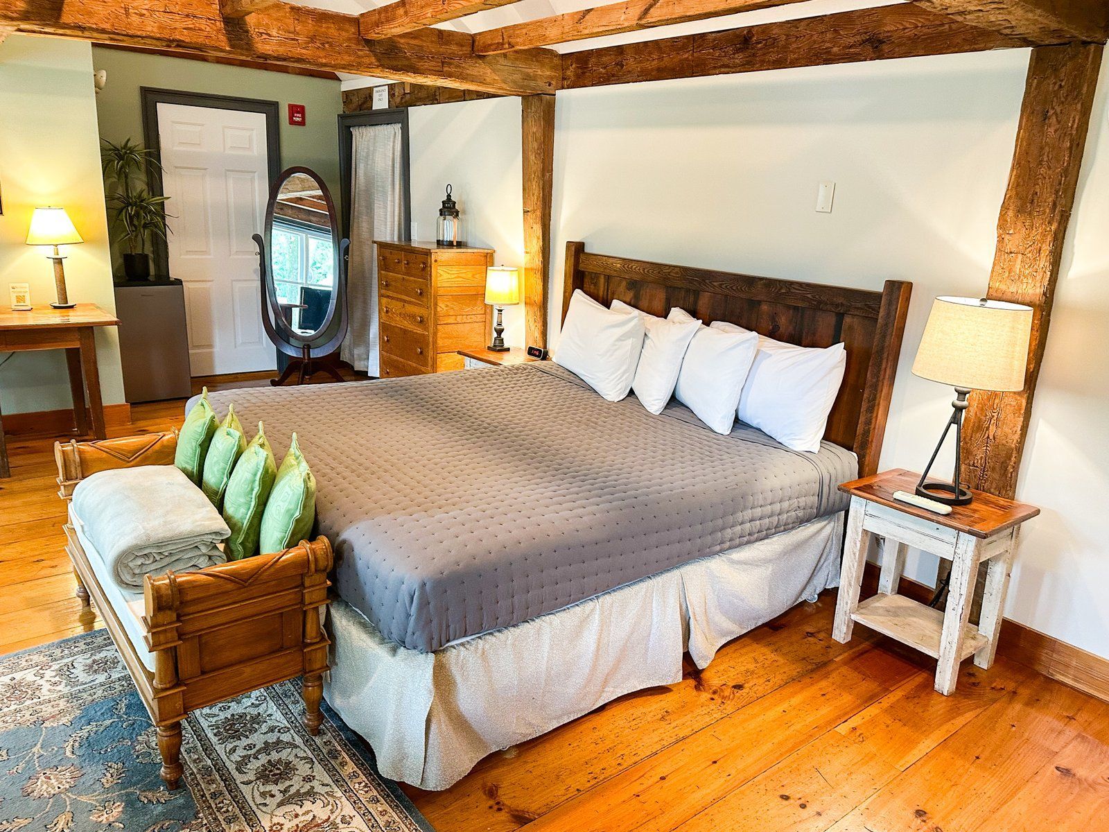 There is a large bed in the middle of the room.