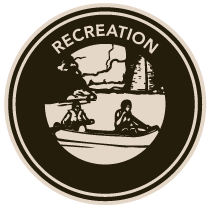A logo for recreation with two people in a boat