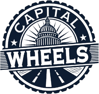 A black and white logo for capital wheels with a capitol building in the center.