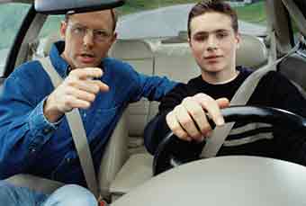 Man Teaching a Boy How to Drive - Driving School in Dumont ,NJ