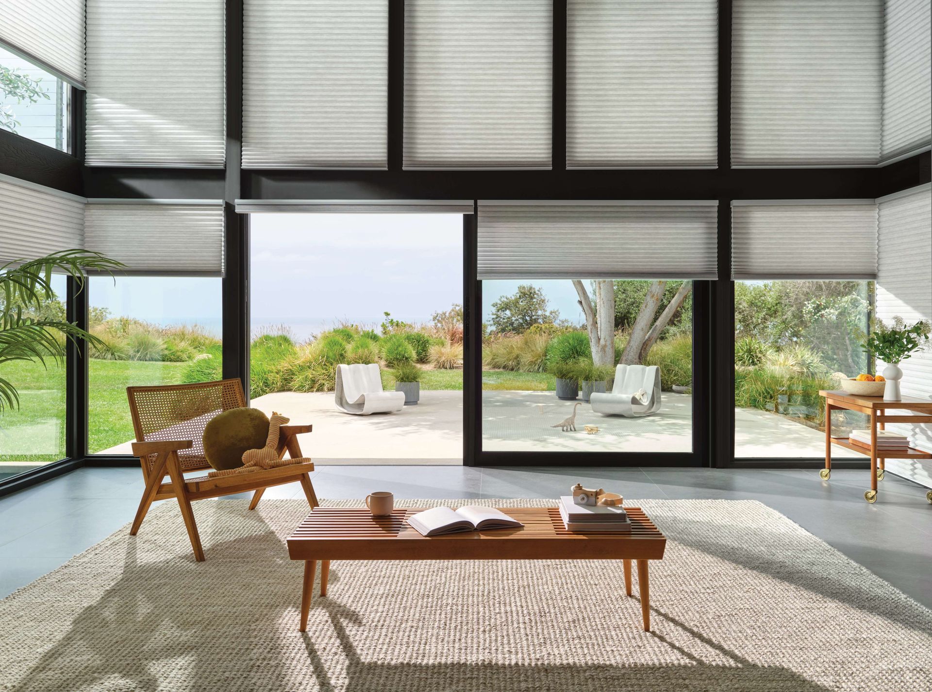 Sunroom of a Puget Sound home with window shades