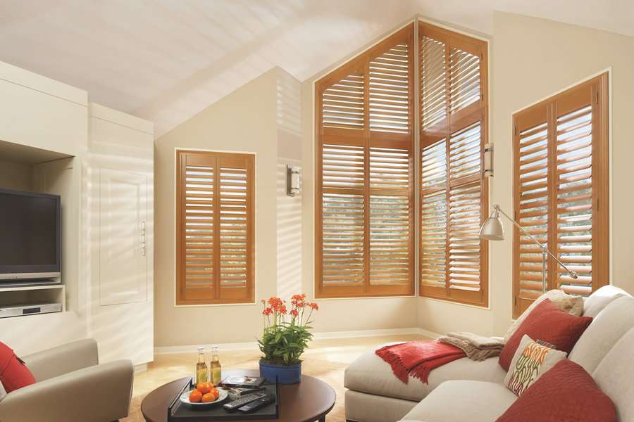 Living room in Burien, WA with HD Newstyle hybrid shutters