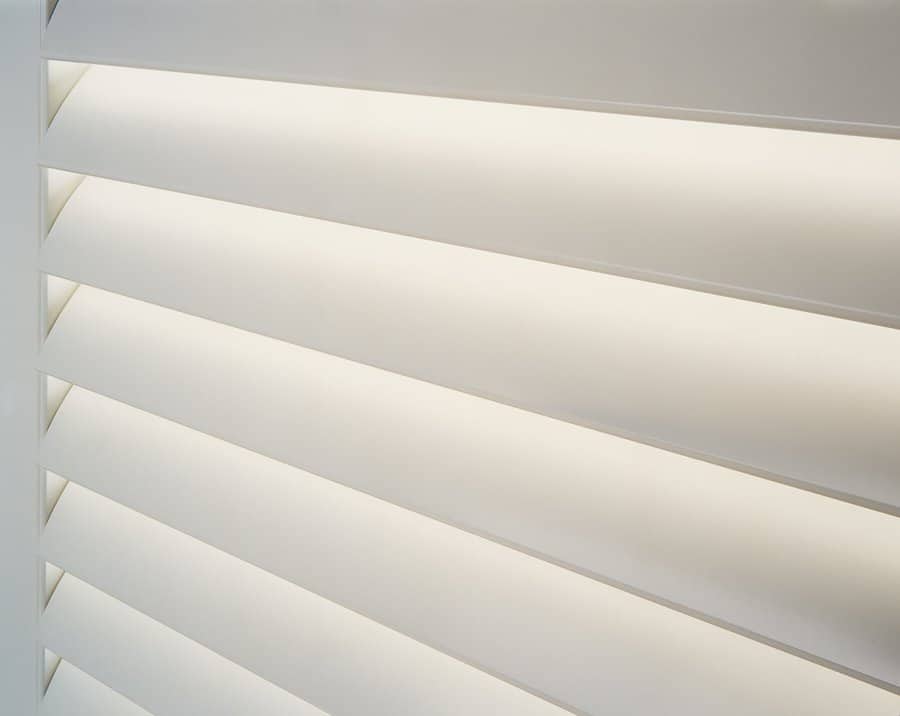 Close up of Hunter Douglas Newstyle hybrid shutters