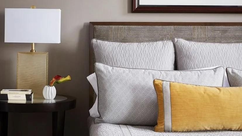 Custom decorative pillows in a modern Kent bedroom