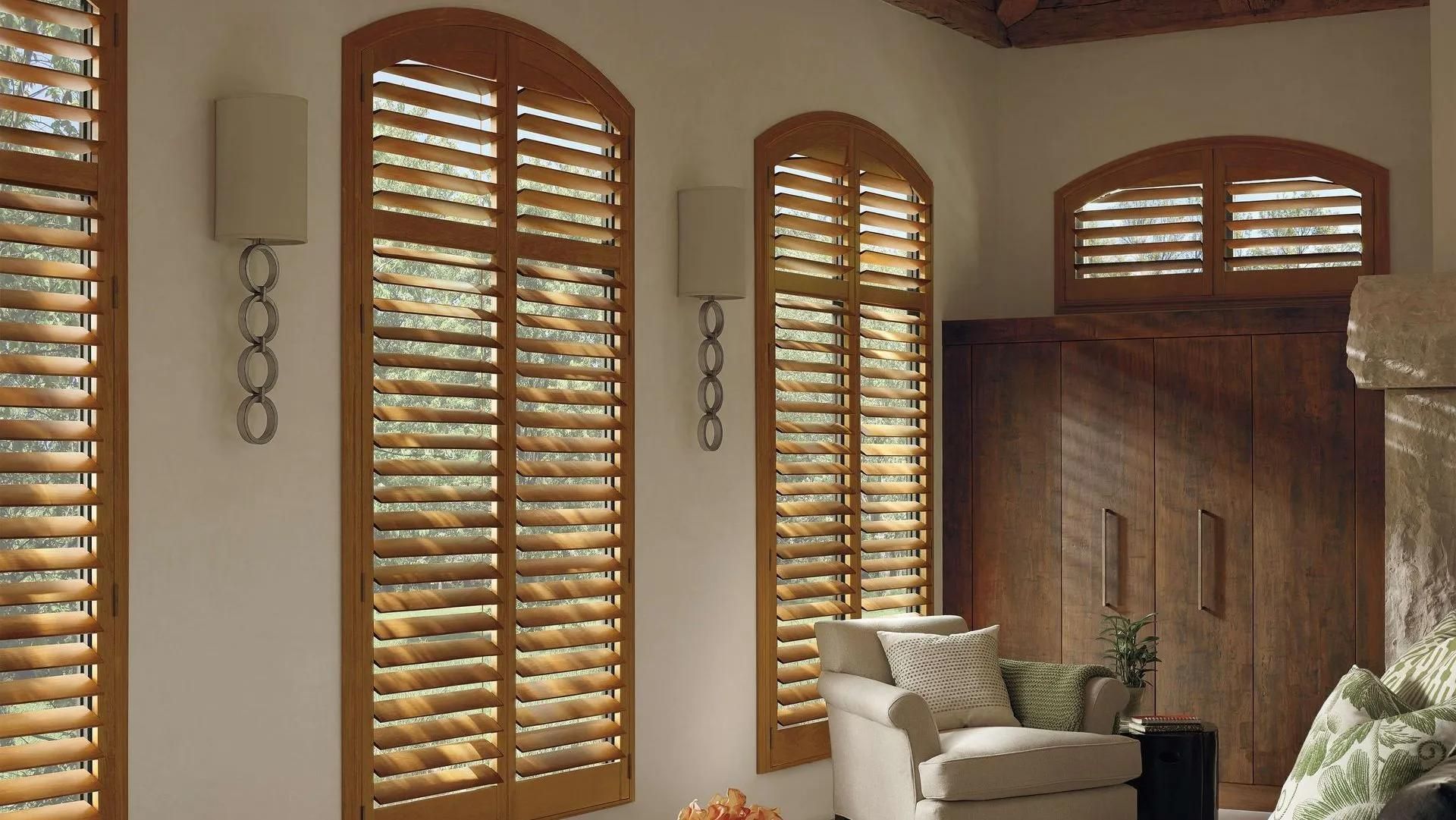 Elegant living room with custom wood window blinds for natural light control