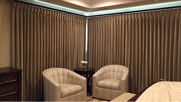 Custom drapes in a master bedroom