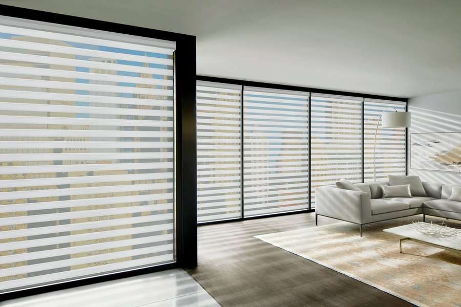 Living room near Newcastle, WA with designed banded shades installed.